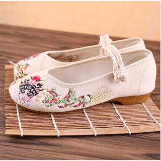 Giày thêu cổ trang - giày thêu hoa văn cô gái
