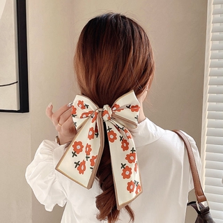 Thun cột tóc đính ngọc trai giả và nơ chất liệu lụa