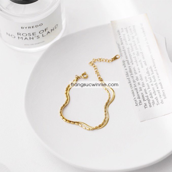Lắc tay nữ titan CK bi