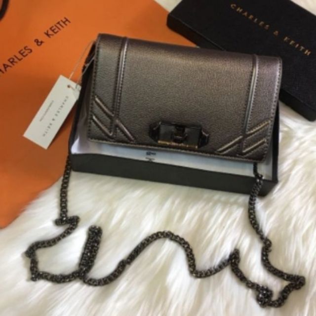 Túi cnk khóa xoay dáng dẹt