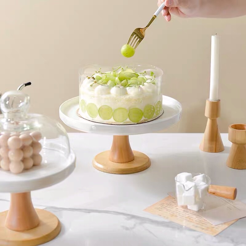 Đế Đựng Bánh Phong Cách Châu Au Hiện Đại Mặt Sứ Trắng Chân Gỗ