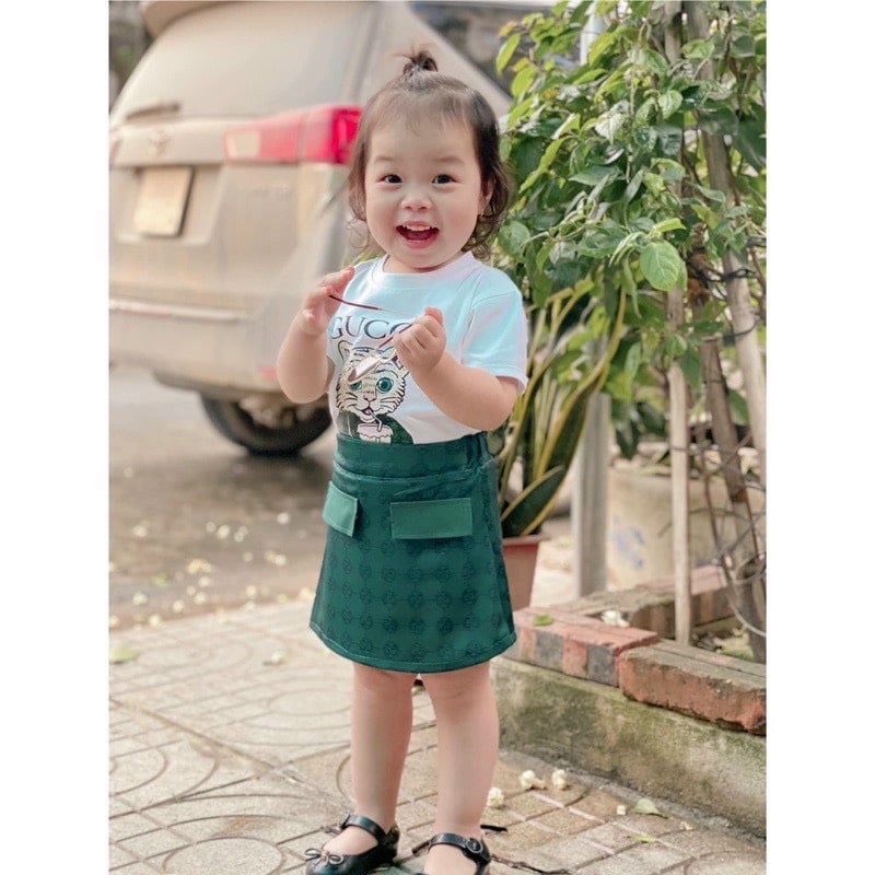 Đồ bộ bé gái bộ đồ áo thun trắng hổ GU mix chân váy xanh chất mềm mịn co giãn tốt JIMADO E1.063.10