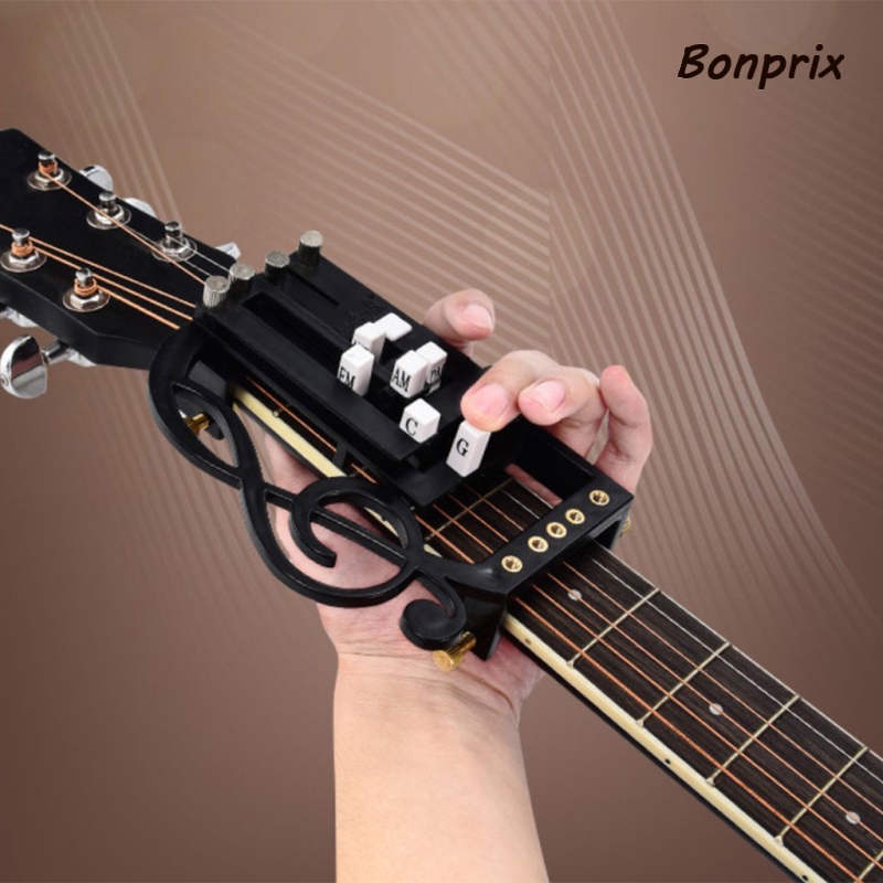 Dụng cụ dạy học đàn guitar acoustic với một phím bấm tiện ích