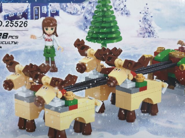 Lego ausini 25526 ông già noel và chiếc xe kéo tuần lộc chở quà tặng giáng sinh cho trẻ em đi trong tuyết rừng thông