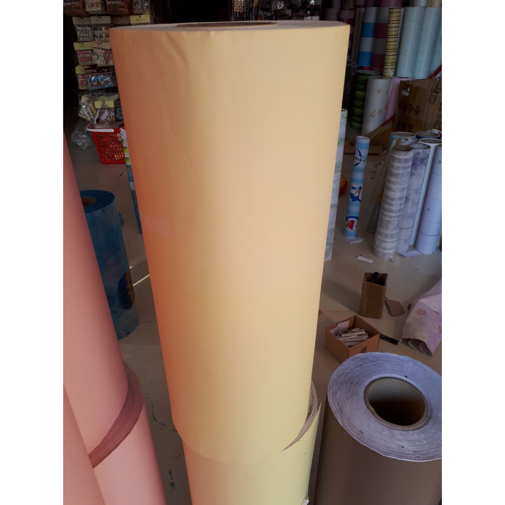 Giấy dán tường màu vàng bề mặt nhám keo sẵn khổ 45cm