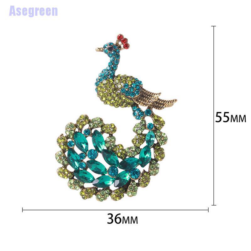 Ghim cài áo hình chim công đính đá xanh lá thời trang