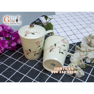 Cốc sứ có nắp men kem vẽ hoa đào