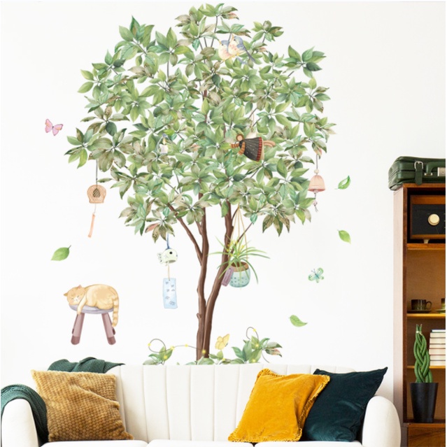 Decal trang trí tường - Chú mèo ngủ trên ghế và cây xanh móc chuông gió