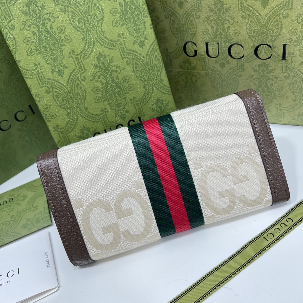 Ví cầm tay nam nữ da thật thời trang cao cấp Gucci GG GC thiết kế thuê nổi logo và đính chữ GG nổi bật trên khóa