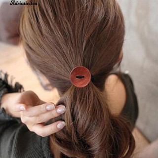 Cột tóc nút gỗ đáng yêu cho nữ