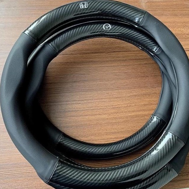 Bọc vô lăng CARBON phối da thoáng khí đủ các hãng xe Toyota-Honda-Hyundai-Mazda-KiA-Ford-Mitshubishi-Chevrolet cao cấp