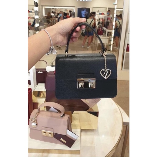 Miếng dán khoá túi Fl top b.e.l.l.a