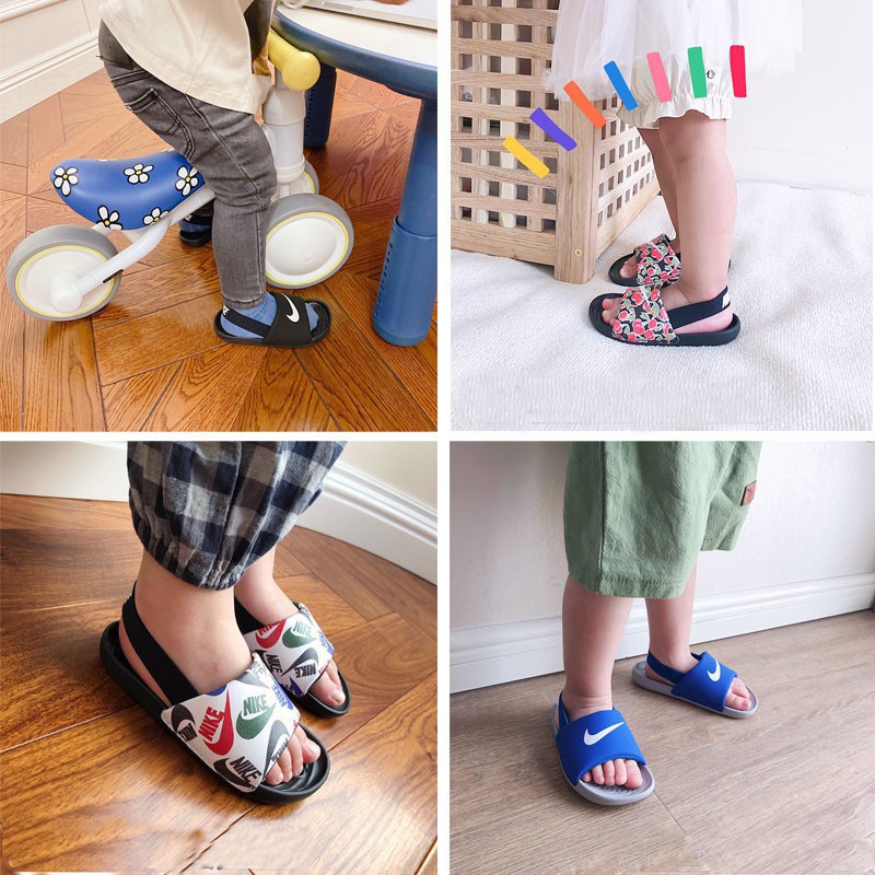 ┇№Giày dép trẻ em Nike Kawa Slide (TD) Dép màu xanh em bé Dép nam và nữ Dép đi biển