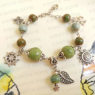 Vòng hạt gốm mix charm