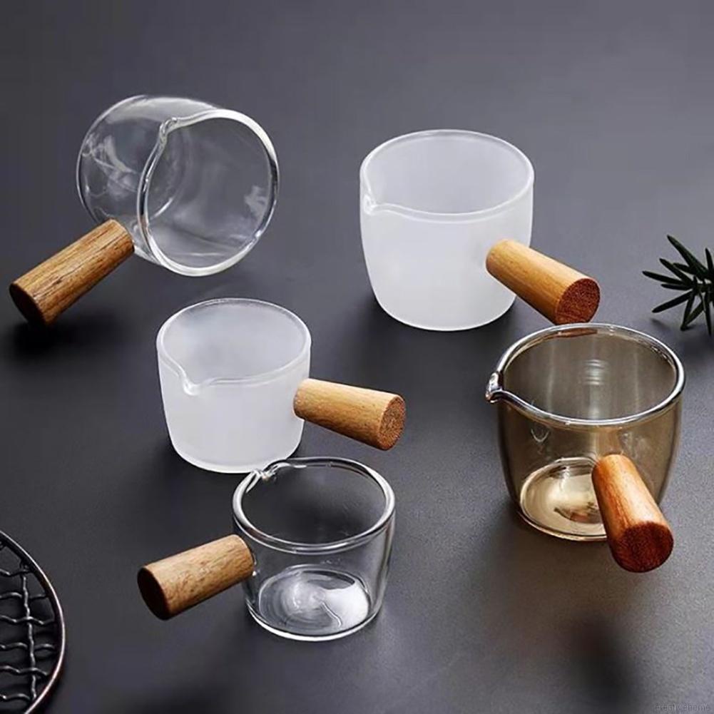 Cốc đo lường bằng thủy tinh dày dặn có tay cầm gỗ