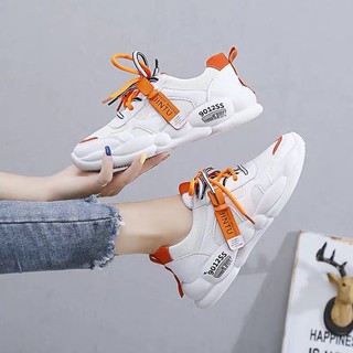 Giày thể thao đế lượn dây vàng, cam
