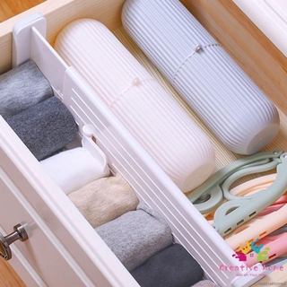 Thanh nhựa chia ngăn tủ có thể kéo dài thu gọn tiện lợi