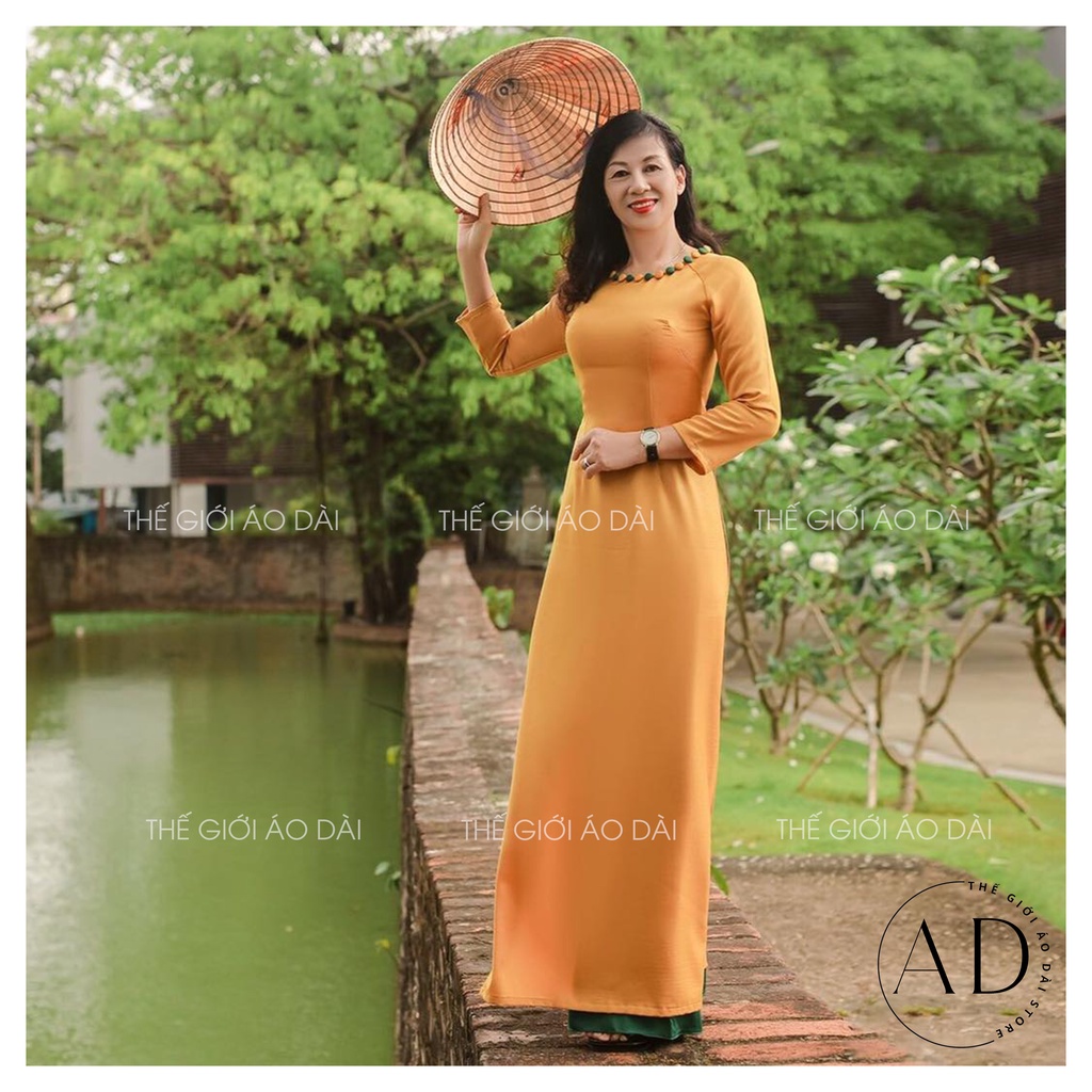 Áo dài tây thi cổ tròn đính cúc phối màu xanh đỏ vàng kèm quần chun co giãn kéo khóa mặc tết đẹp