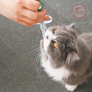 Dụng cụ cho mèo uống thuốc