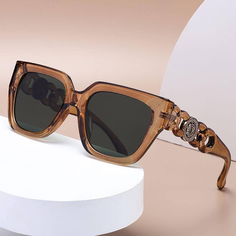 Kính Mát Mắt Mèo Chống Bức Xạ Phối Dây Xích Thời Trang Cho Nam Và Nữ