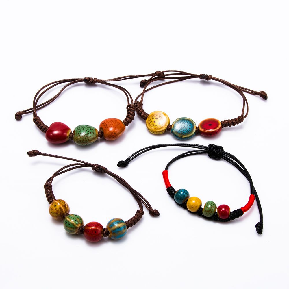 Vòng Đeo Tay Kết Hạt Sứ Hình Chiếc Lá Cho Nam Và Nữ