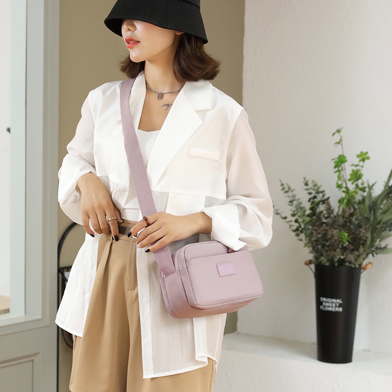 Ba Lô Vải Nylon Màu Sắc Macaron Thiết Kế Đơn Giản Sức Chứa Lớn Cho Nữ