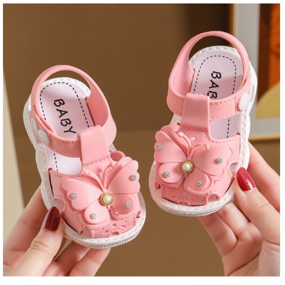 GIÀY SANDAL TẬP ĐI HÌNH NƠ VÀ HOA CÚC BẤM CHO BÉ