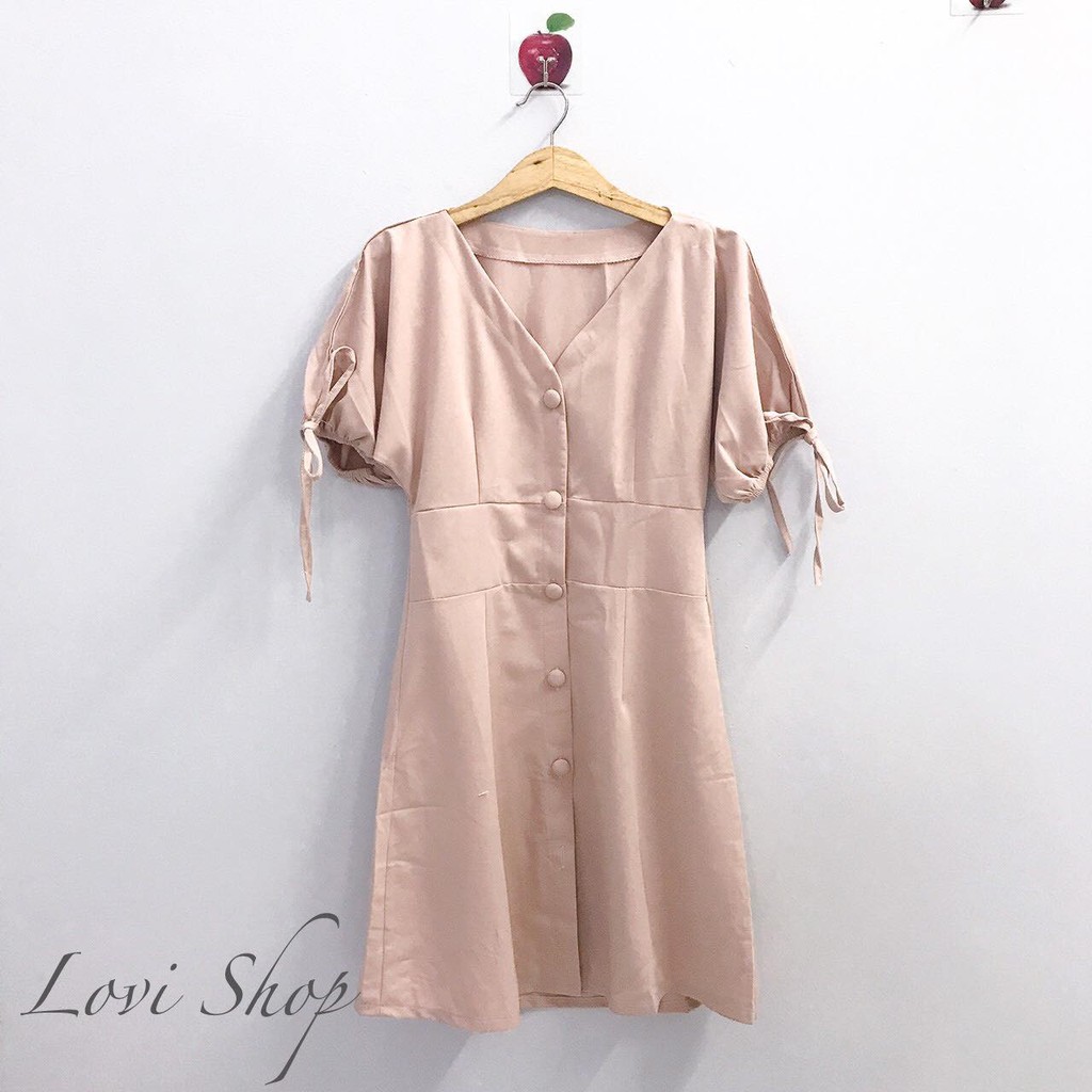 Đầm nude tay bồng nút bọc