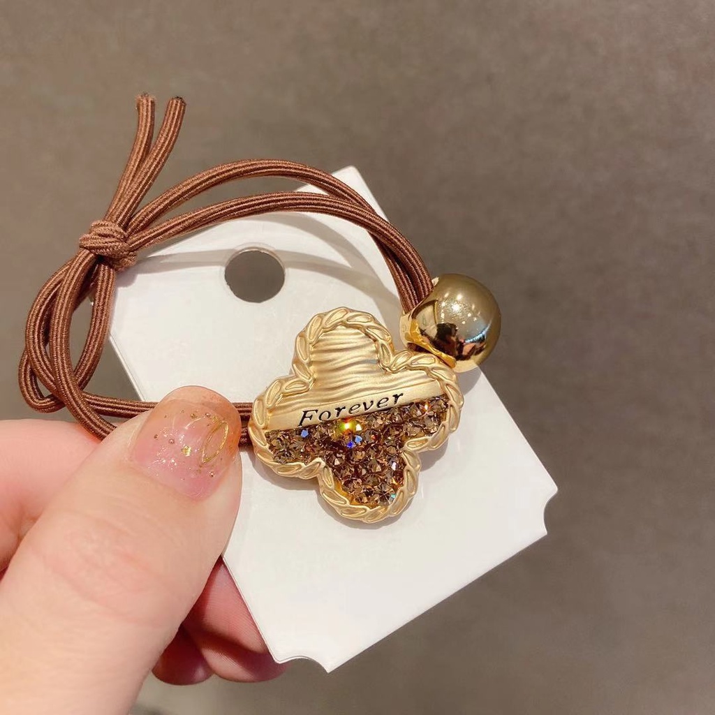 Dây Chun Buộc Tóc Xinh Xắn Hình Ngôi Sao Vàng Dễ Thương Sang Chảnh Cho Phái Nữ