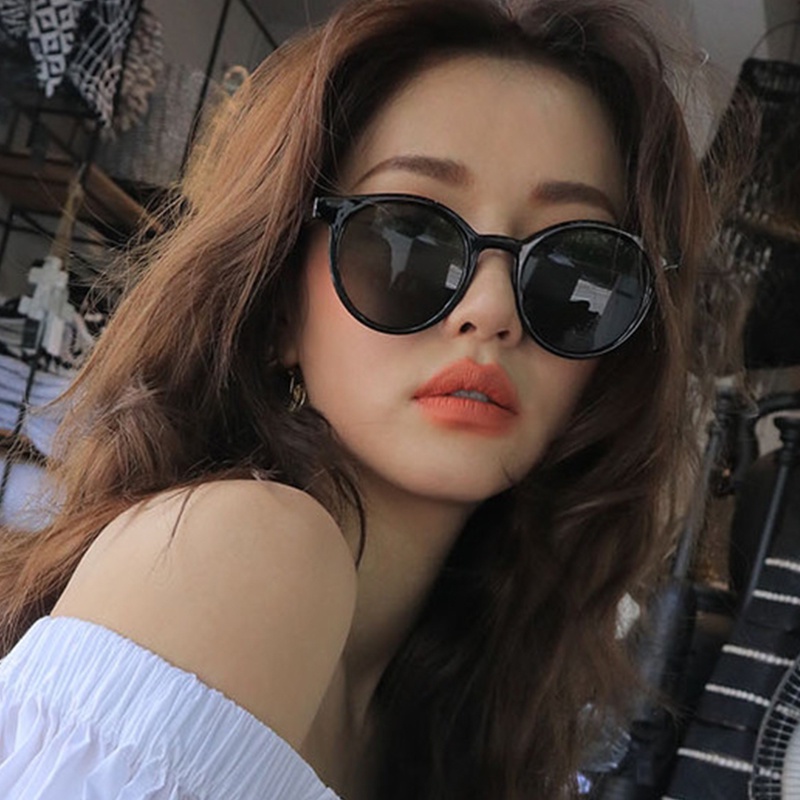 Kính mát gọng tròn cá tính thời trang