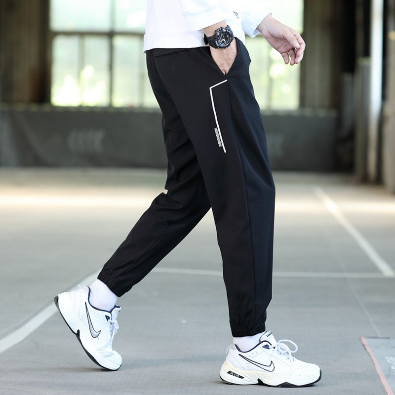 Quần jogger thể thao màu trơn chất gió dù mềm mịn in họa tiết phong cách Hàn Quốc cho nam quần gió nam