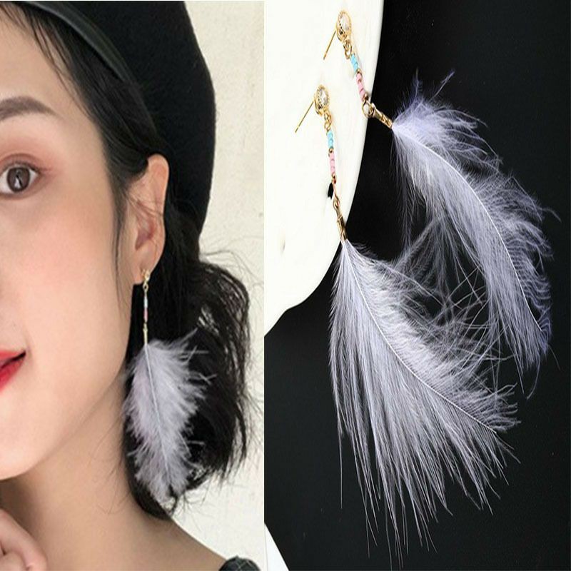 khuyên tai lông trắng. chất lông nhẹ dẹp
