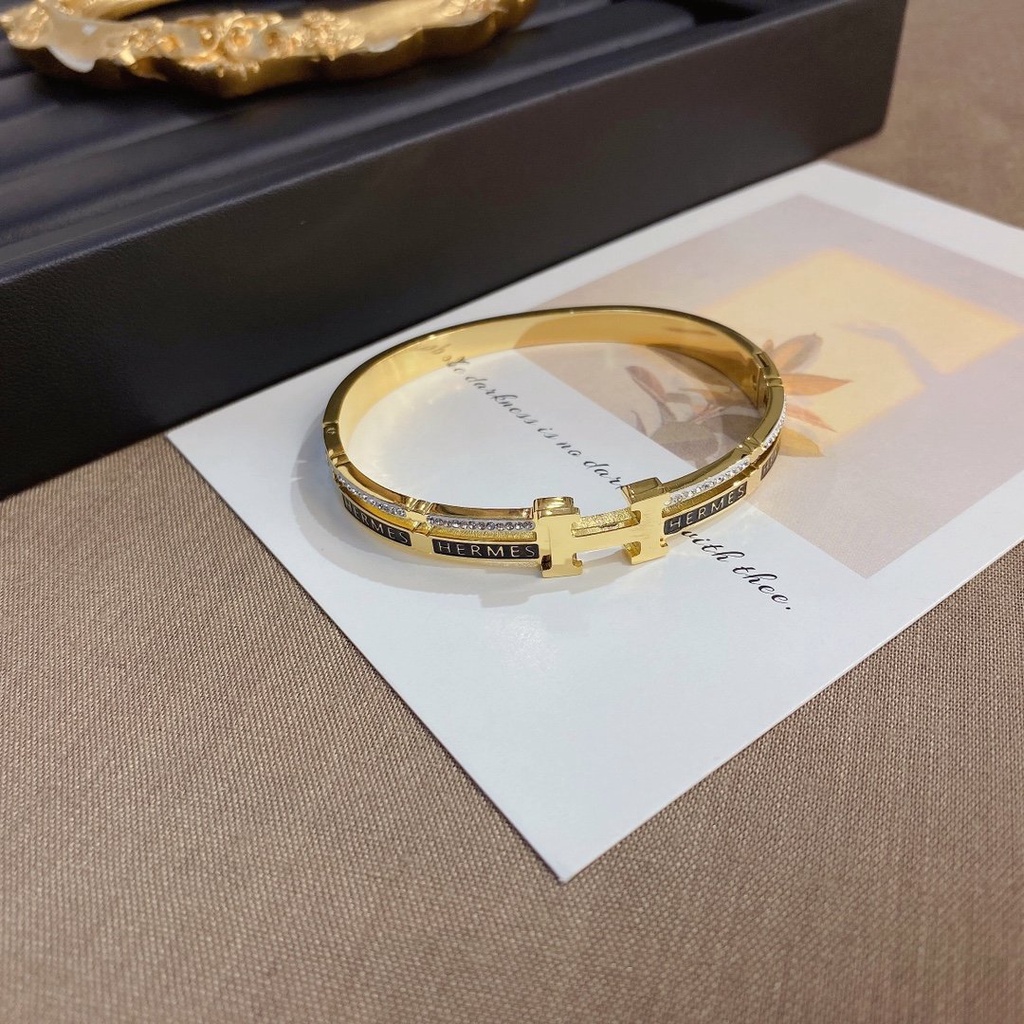 Vòng Tay Hermes Bằng Thép Titan Khắc Chữ H Thời Trang