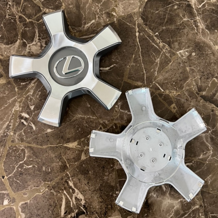 01 Logo chụp mâm, ốp lazang bánh xe ô tô Lexus LX-570 TY-K199  Đường kính chân cài: 10cm, Cao: 3.5cm