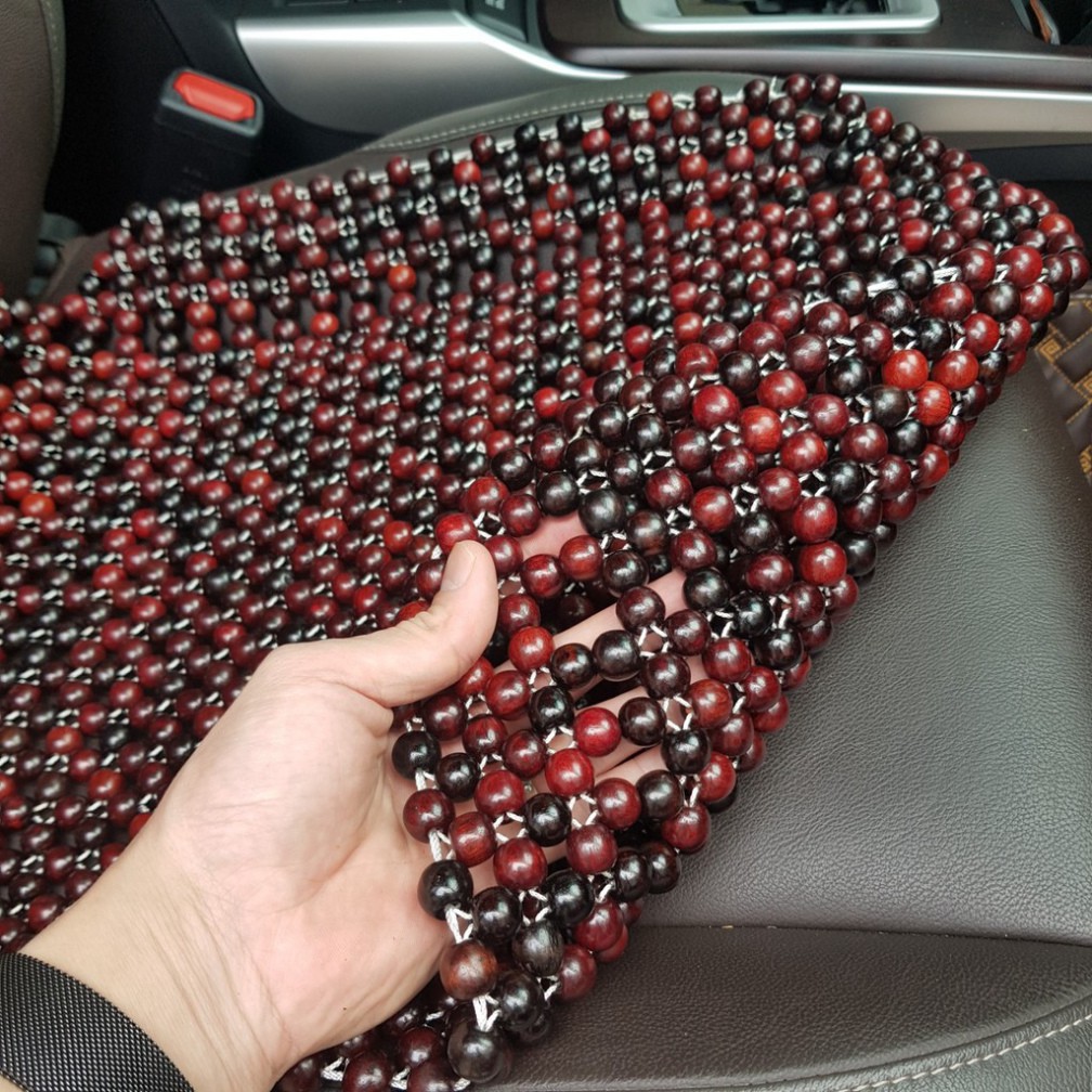 Sản Phẩm Đệm lót ghế ô tô hạt gỗ Cẩm Lai 100% tự nhiên tựa lưng massage trên ô tô .