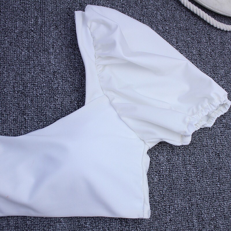 Bikini 2 mảnh tay bồng buộc nơ 2 màu đen-trắng