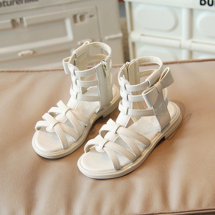 Sandal chiến binh đính nơ ở cạnh cho bé gái - Dép cao cổ có quai đan chéo, đế mềm êm chân chống trượt cho bé