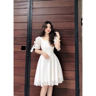 Đầm trắng cổ u nút bọc tay voan nơ kt