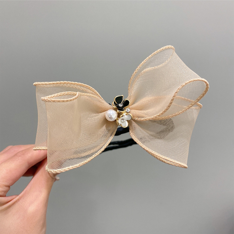 Thun côt tóc hình hoa kiểu dáng đáng yêu cho nữ