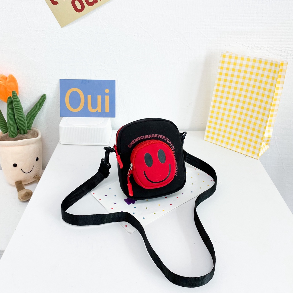 Túi Đeo Chéo Vai Hình Tròn Nhỏ Vải Canvas Họa Tiết Mặt Cười Hoạt Hình Dễ Thương Cho Trẻ Em