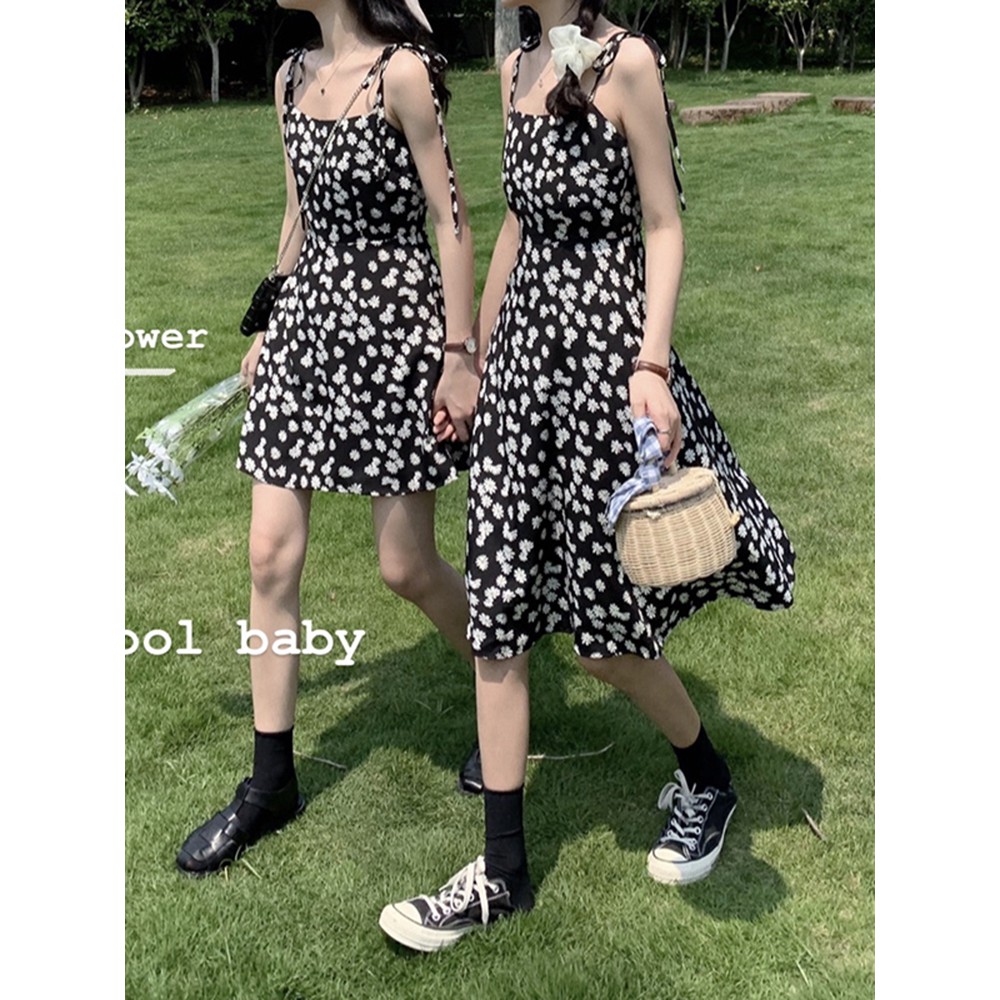 váy 2 dây cúc họa mi nhí điệu đà
