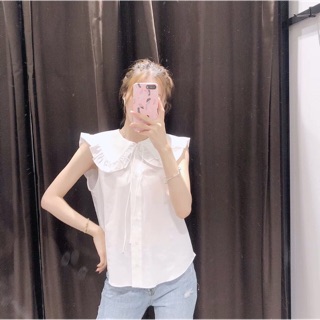Áo trắng cột nơ cổ