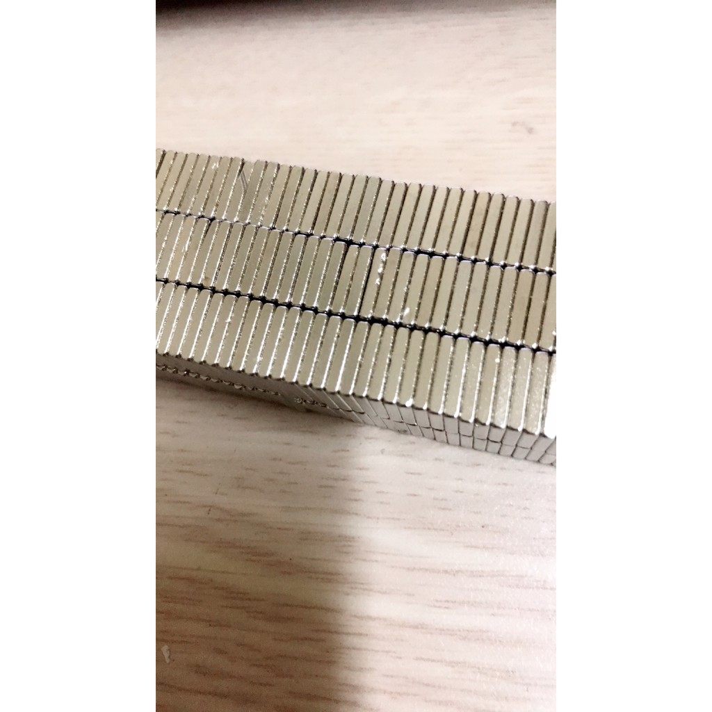 Nam châm viên 10x10x2 mm, loại na châm trắng đất hiếm hút cực mạnh.