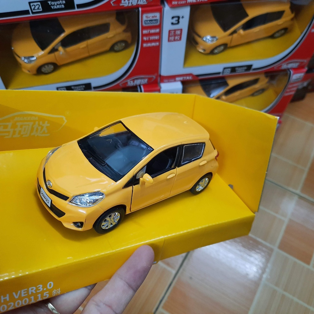Xe mô hình ô tô RMZ Toyota Yaris tỉ lệ 1:32 xe bằng kim loại mở được cửa