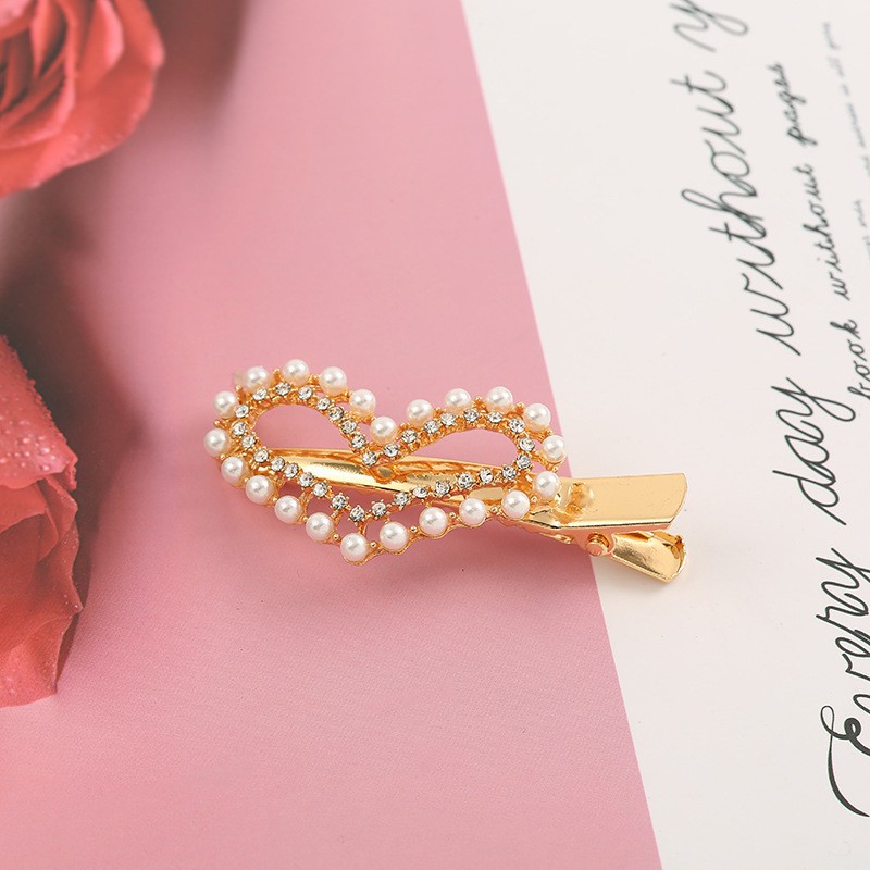 Kẹp tóc ngọc trai giả dễ thương cho bé gái