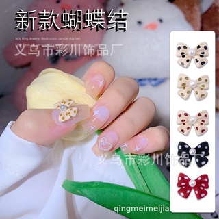 charm nơ chấm bi trang trí móng tay