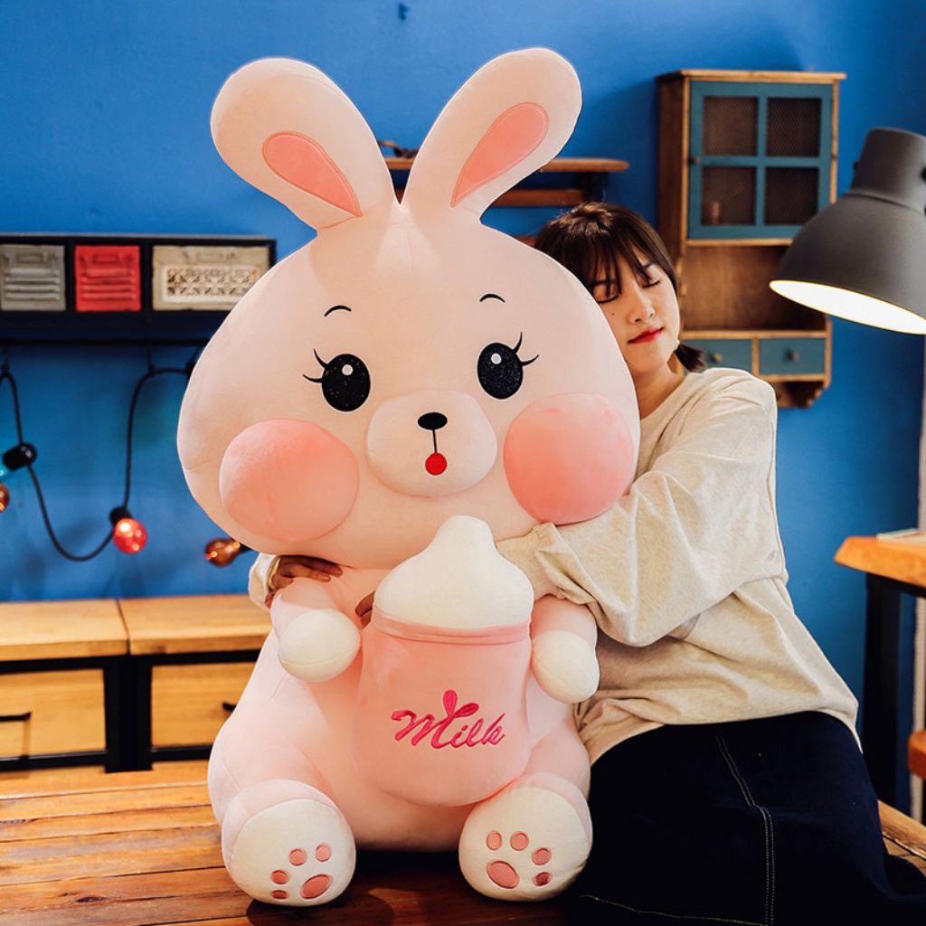 Gấu bông gối ôm thỏ ôm bình sữa thú nhồi bông dễ thương chất liệu mềm mại SHOPBANDON