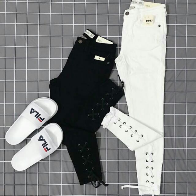 Quần jeans đan dây chân