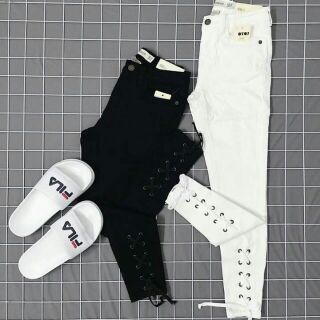 Quần jeans đan dây chân