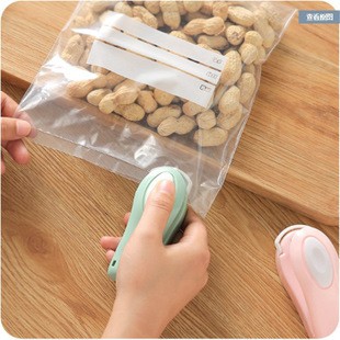 Dụng cụ dán miệng túi, máy hàn ni lông mini